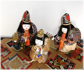 японские традиционные куклы и пояс оби